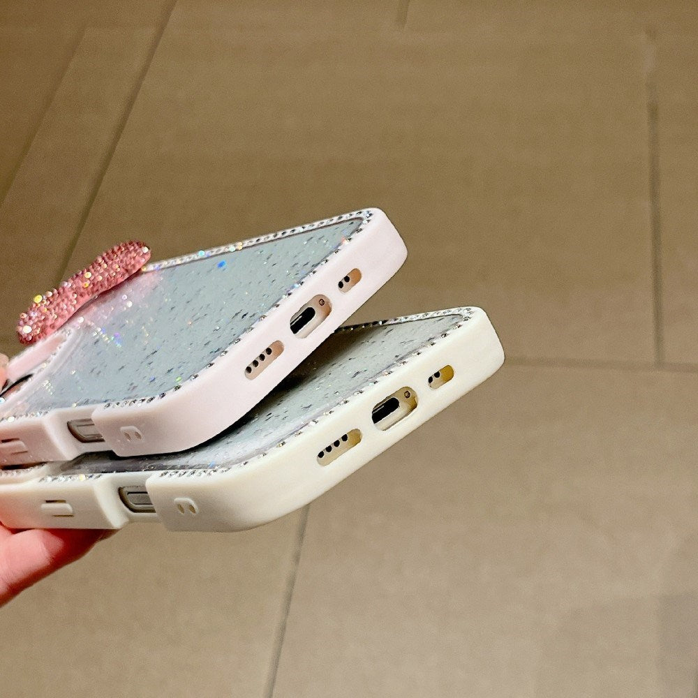 EIDERWOOD iPhone 16 Hybrid Mobil Cover m. 3D Sløjfe og Rhinsten - Gennemsigtig / Lilla