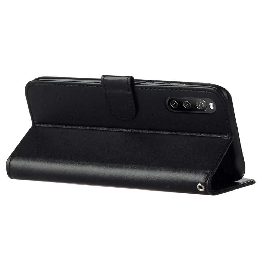 Sony Xperia 10 V Læder Flip Mobil Cover m. Pung og Strop - Sort