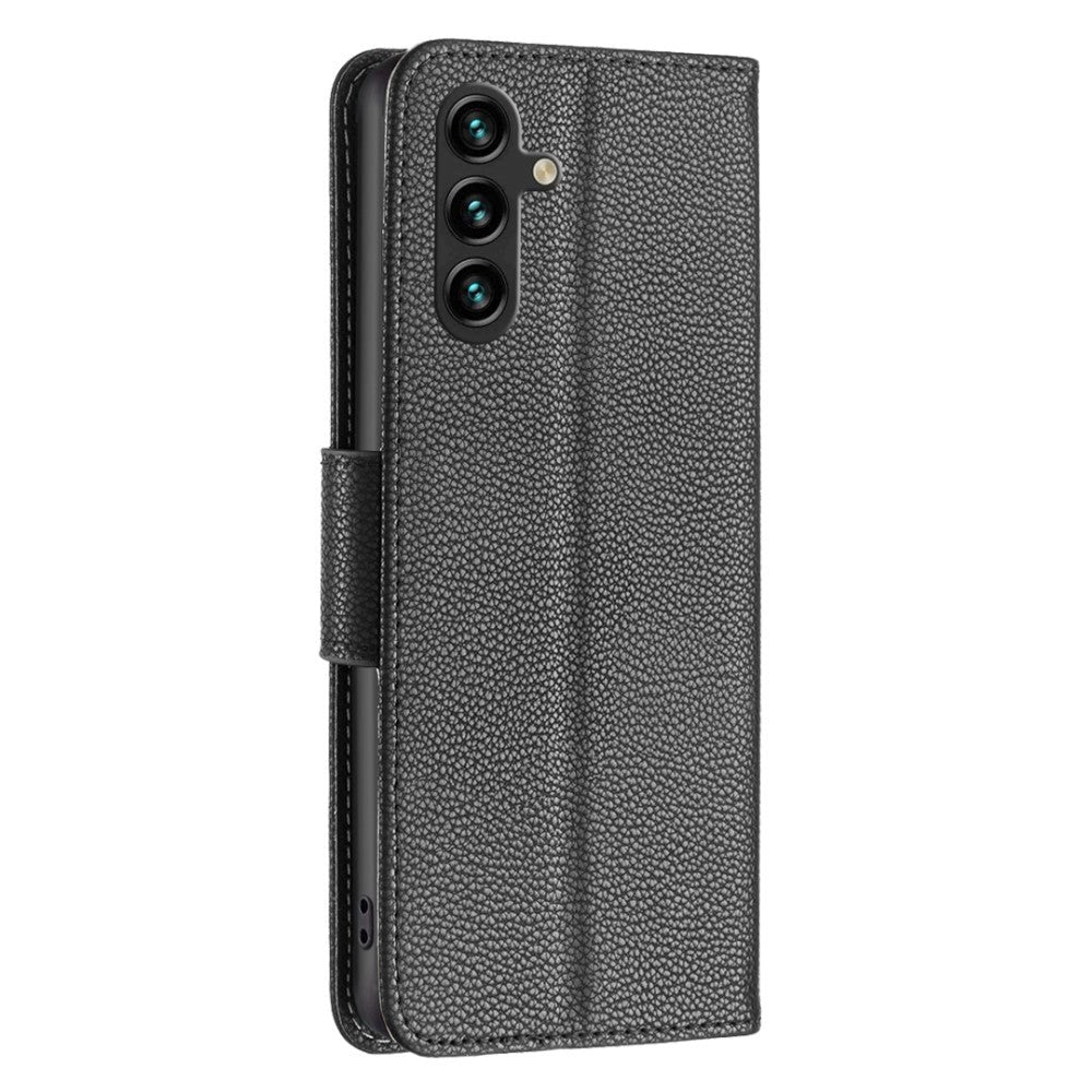 Samsung Galaxy A15 (5G) / A15 PU Litchi Læder Mobil Cover m. Pung & Strop - Sort