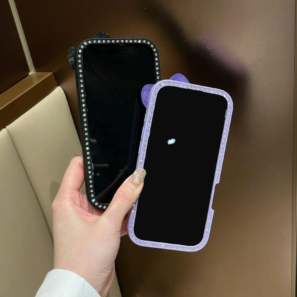 EIDERWOOD iPhone 16 Hybrid Mobil Cover m. 3D Sløjfe og Rhinsten - Gennemsigtig / Lilla